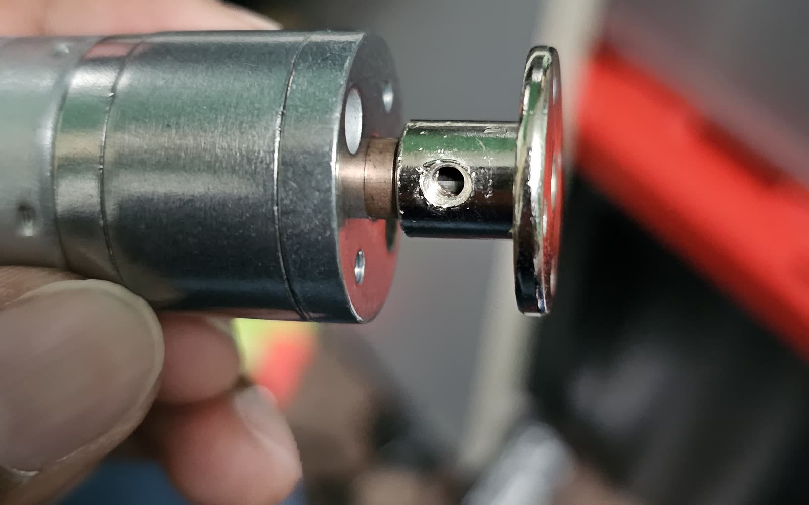 A drive motor being fitted with a machined shaft coupler